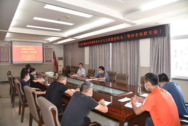 图为市委党史学习教育宣讲团成员为市残联干部职工作宣讲.JPG